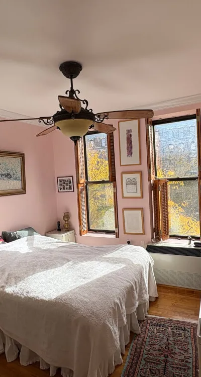 Bright corner 1BR—modern kitchen, roof deck, safe building; short/long term, near Columbia & City College