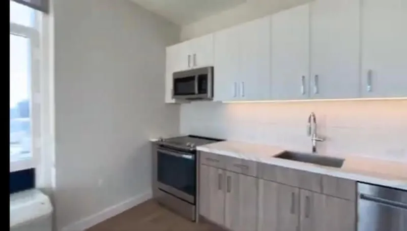 Cozy Living Room Space in Luxury JSQ Building | 10-Min Walk to PATH | Great Amenities