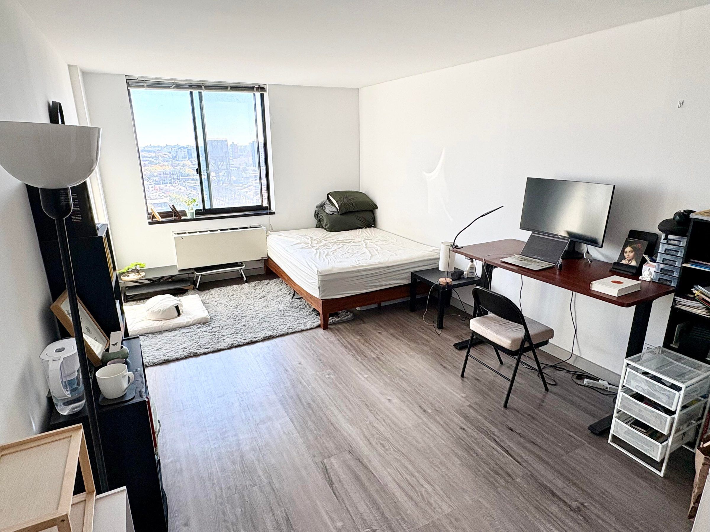 Spacious Master Bedroom with Private Bathroom and East River Views at Manhattan Park