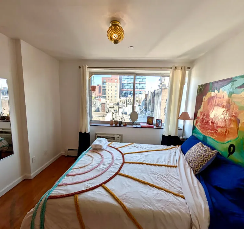 Colorful Furnished LES 2bd apartment w/ balcony, w/d, elevator & more!