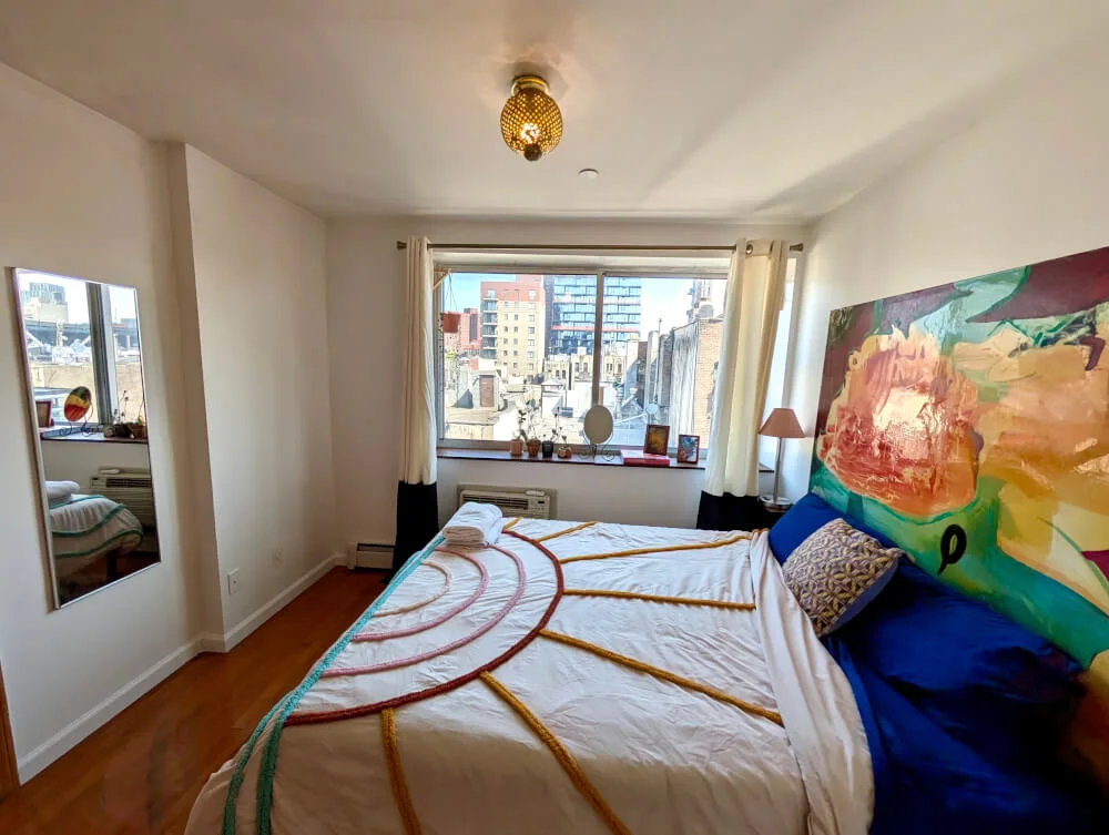 Colorful Furnished LES 2bd apartment w/ balcony, w/d, elevator & more!