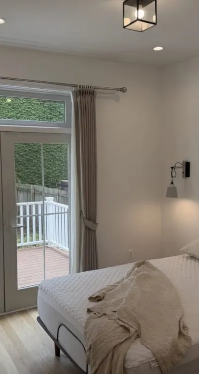 Modern 1BR + Dedicated Den & Private Deck | Steps to PATH