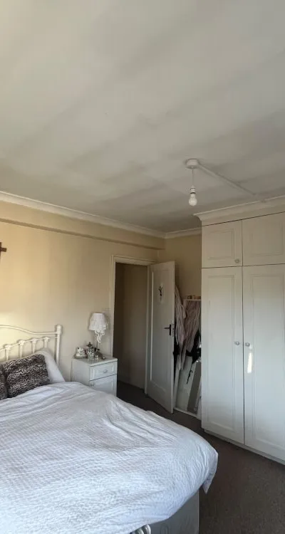 Spacious double bedroom with loads of storage and natural light