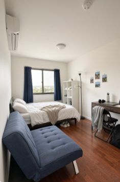 Rego Park Penthouse Primary Bedroom with Manhattan Views