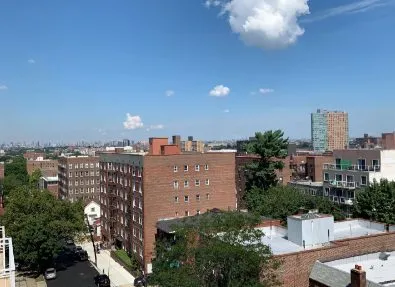Rego Park Penthouse Primary Bedroom with Manhattan Views