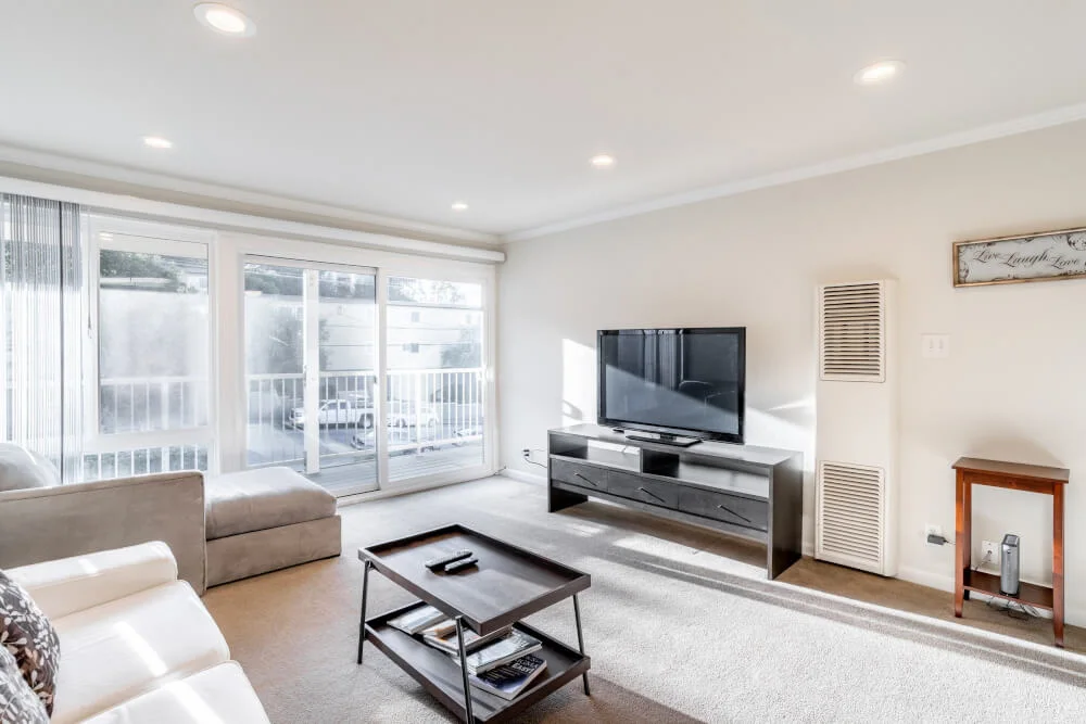 Village · Modern 1BR: Gym, Balcony, Grill—Near Tech Hubs